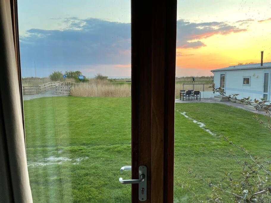 Strandvakantiehuisje! فوركوم المظهر الخارجي الصورة